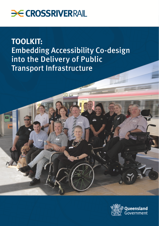 Front cover of the Cross River Rail "Embedding Accessibility Co-Design into the Delivery of Public Transport Infrastructure" Toolkit. Text is white on a dark blue background, with a diagonally cut image of a group of people with disability and Queensland Rail staff members standing on a train station. The Queensland Government logo sits at the bottom right of a wide dark blue strip at the bottom of the page. 
