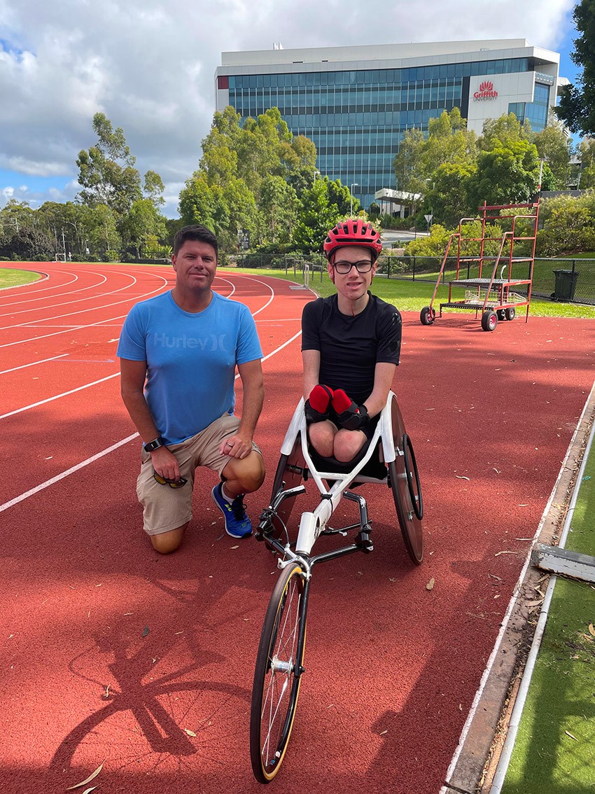 Elijah Palmer with coach Garth Plank training at Griffith University, Gold Coast.